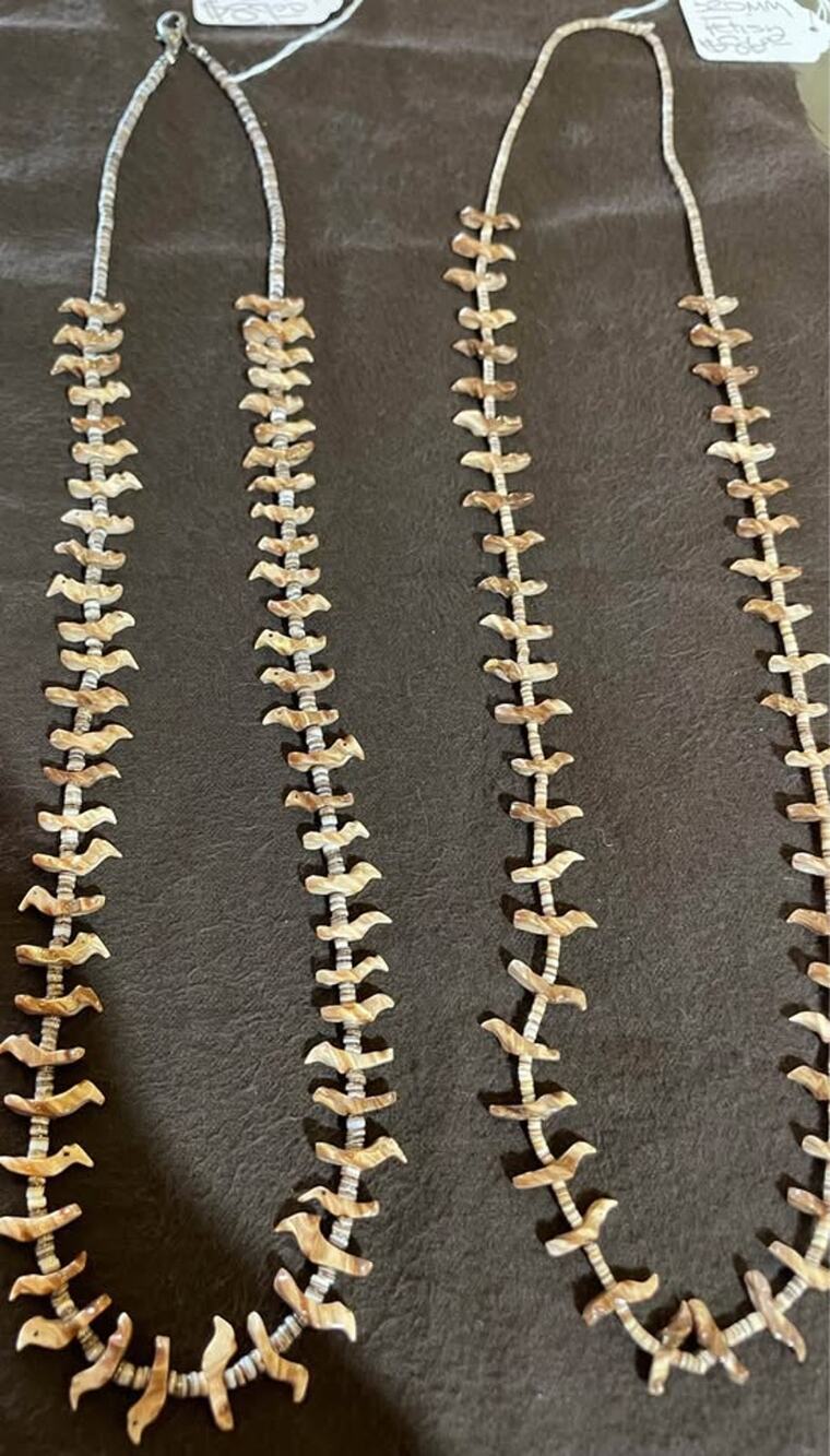 Two Shell Bird Fetish Necklaces priced individually.